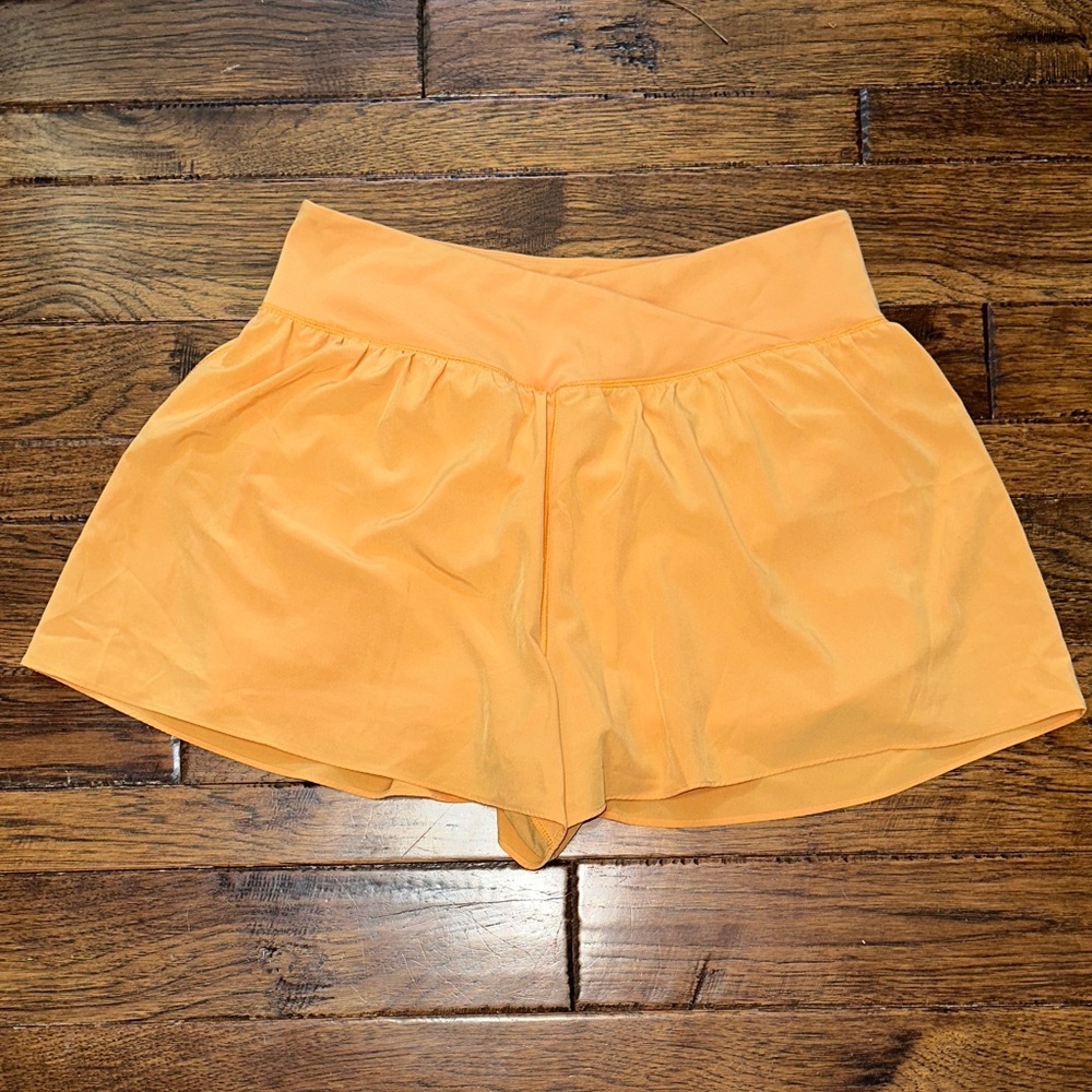 🍊 Maurices NWOT vibrant orange flutter shorts with lining size large
